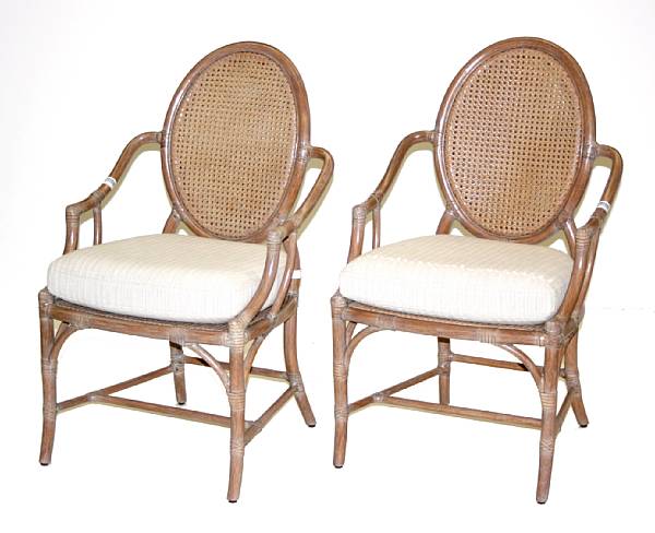 Appraisal: A pair of caned rattan armchairs McGuire Furniture Company st