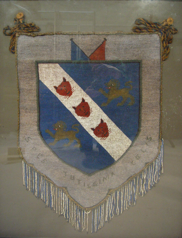 Appraisal: Beadwork coat of arms in a glazed frame attributed to