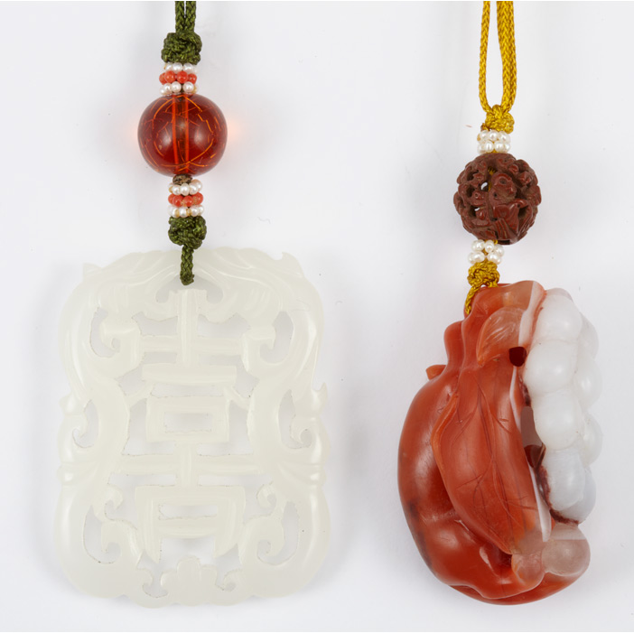 Appraisal: Two Chinese Pendants th th Century Comprising a white jade