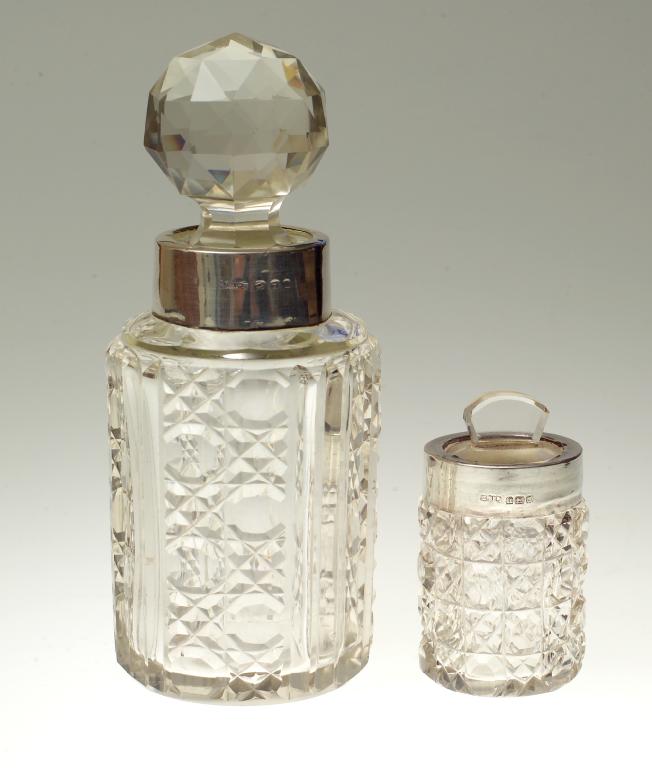 Appraisal: VICTORIAN CUT-GLASS AND SILVER-MOUNTED SCENT BOTTLE BIRMINGHAM the cylindrical body