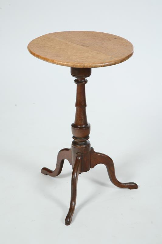 Appraisal: CANDLESTAND Round birdseye maple top on a cherry turned pedastal