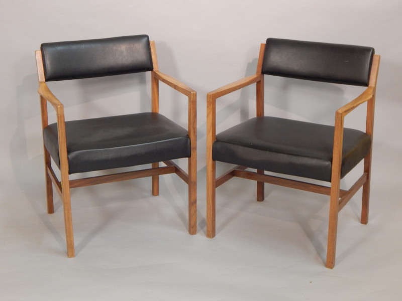 Appraisal: A pair of R Foster Sons Retro walnut open armchairs