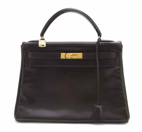 Appraisal: An Hermes Brown Leather Kelly Bag with goldtone hardware lock