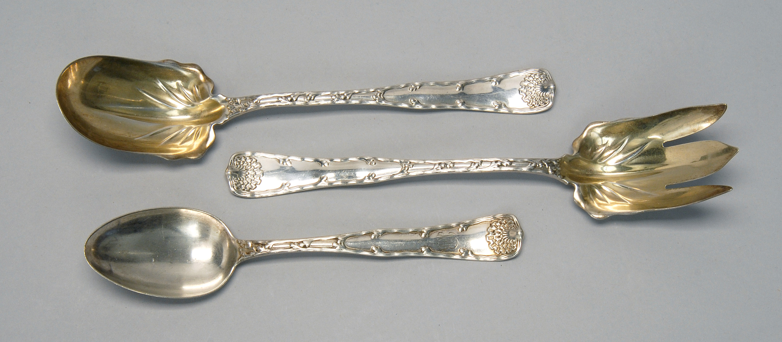 Appraisal: THREE TIFFANY CO STERLING SILVER ITEMS A two-piece salad set