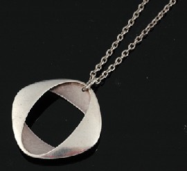 Appraisal: A silver pendant and chain by Georg Jensen The sterling