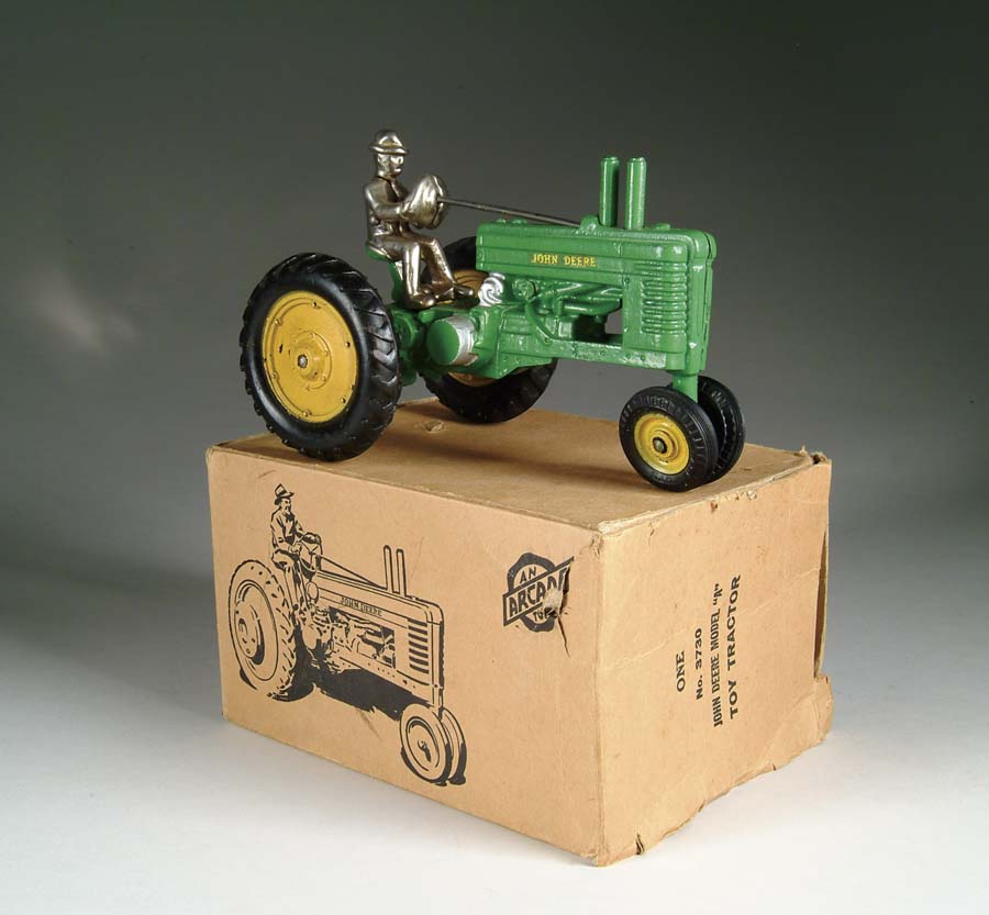 Appraisal: JOHN DEERE GREEN TRACTOR W OB BY ARCADE A John