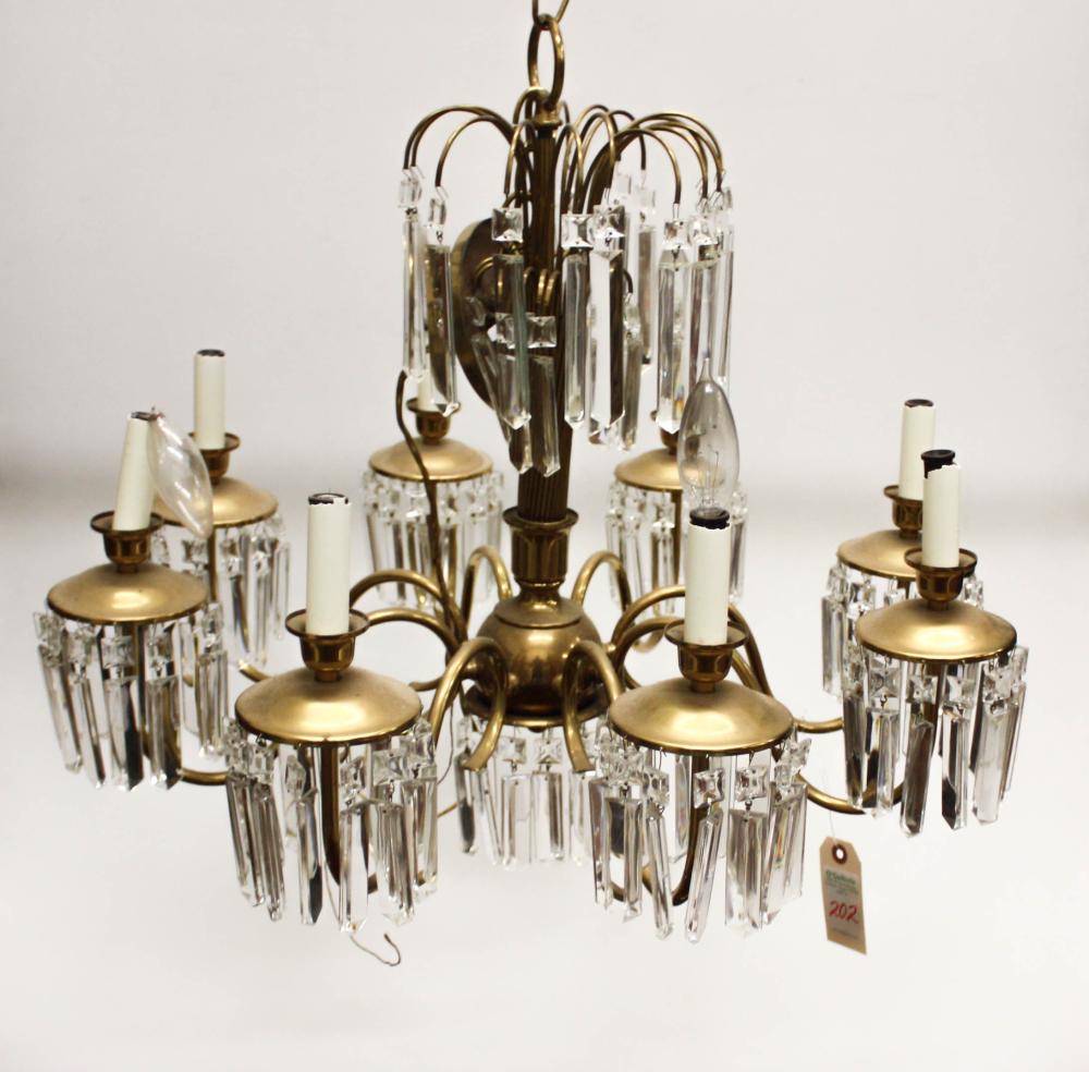 Appraisal: EIGHT LIGHT BRASS AND CRYSTAL CHANDELIER each of the eight