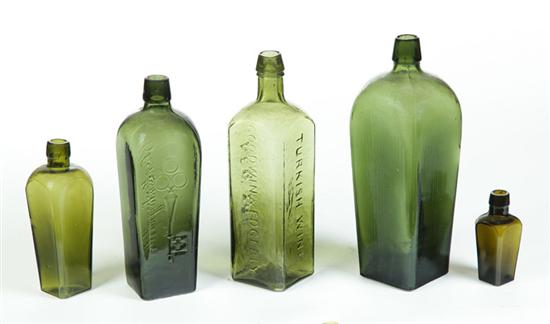 Appraisal: FIVE BOTTLES American nd half- th century Olive glass gin