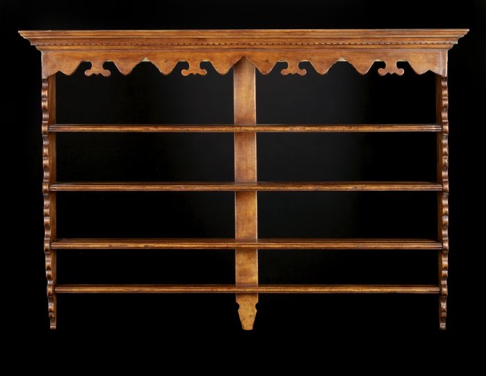 Appraisal: French Provincial-Style Fruitwood Hanging Rack the molded and dentillated cornice