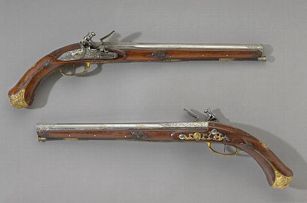 Appraisal: A pair of composite flintlock holster pistols Each with inch