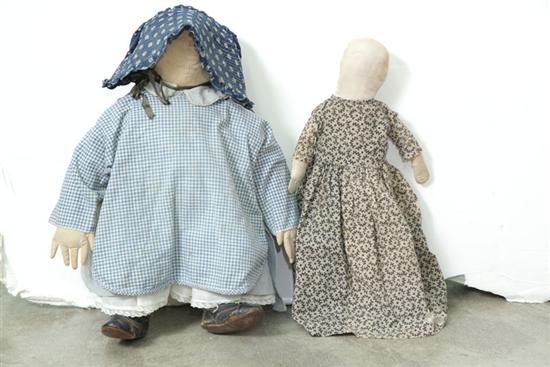 Appraisal: TWO AMISH DOLLS One in a brown and black dress