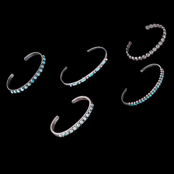 Appraisal: Zuni Row Bangles with Tiny Turquoises Collected by Virginia Doneghy