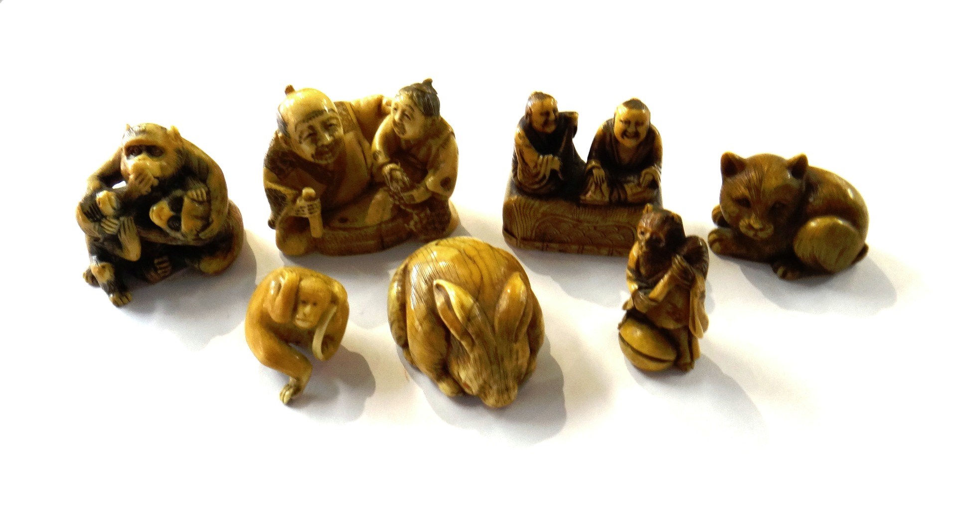 Appraisal: A group of seven Japanese ivory netsuke th th century