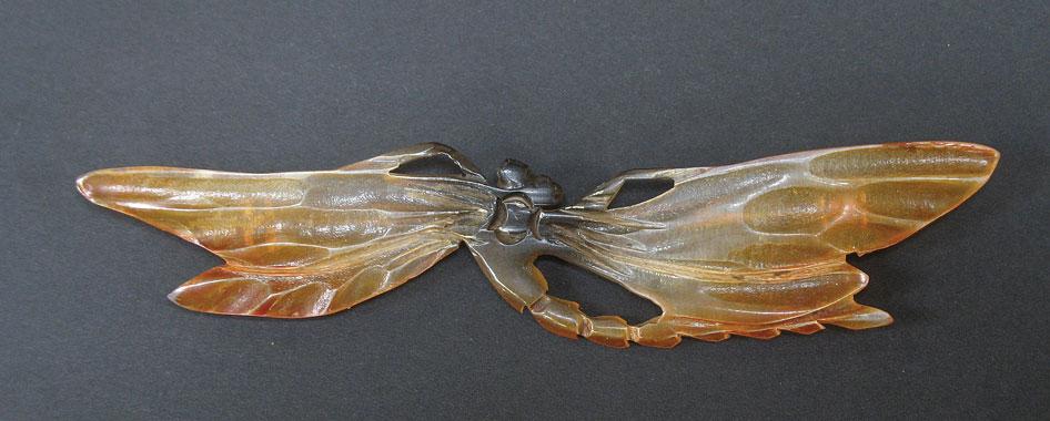 Appraisal: GEORGE PIERRE AN ART NOUVEAU RESIN BROOCH carved in the