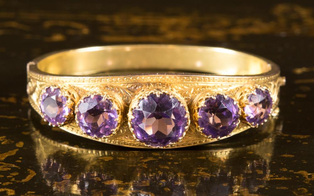 Appraisal: VICTORIAN AMETHYST AND FOURTEEN KARAT GOLD BANGLE circa 's The