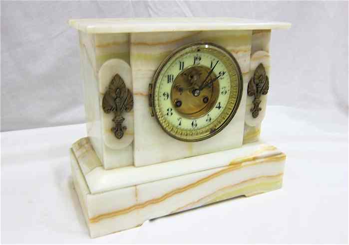 Appraisal: AN ONYX CASED MANTEL CLOCK Japy Freres Cie Grande Med