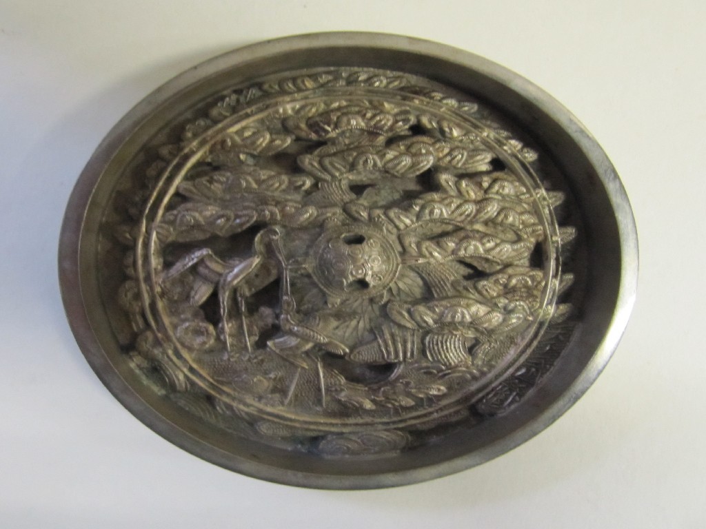 Appraisal: Chinese bronze mirror cast with a scene of storks and