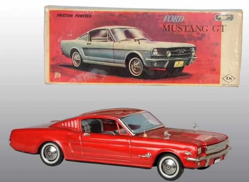 Appraisal: Tin Ford Mustang Friction Toy Description Japanese Circa Working Made