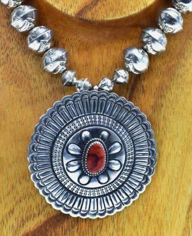 Appraisal: Native American silver content unknown necklace sterling stamped pendant with