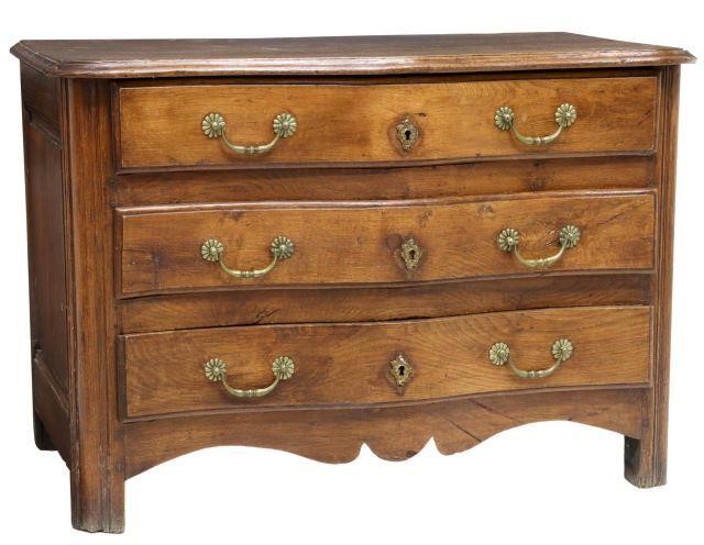 Appraisal: French Louis XIV style oak commode th c serpentine-front case