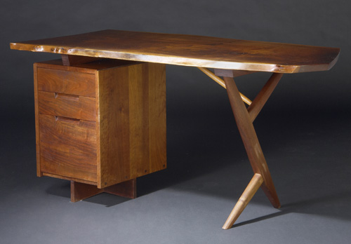 Appraisal: GEORGE NAKASHIMA Walnut Conoid desk with free-edge top and three