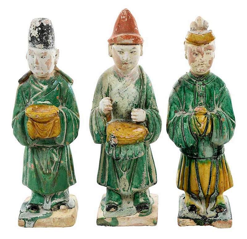 Appraisal: Three Chinese Tang Figures Chinese robed monk figures with sancai