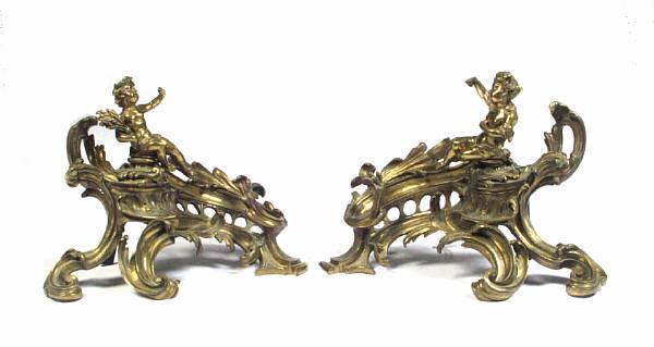 Appraisal: A pair of Louis XV style gilt bronze figural chenets