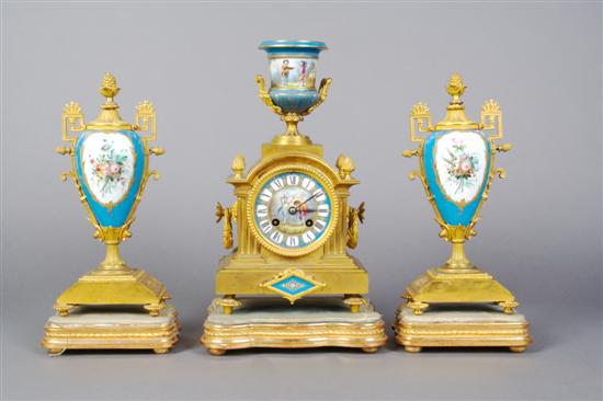 Appraisal: A French Gilt Bronze and Sevres Style Porcelain Clock Garniture