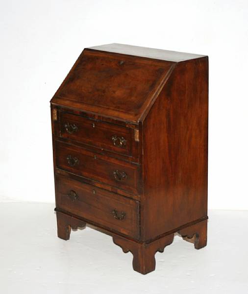 Appraisal: A petite George III style slant front desk second quarter