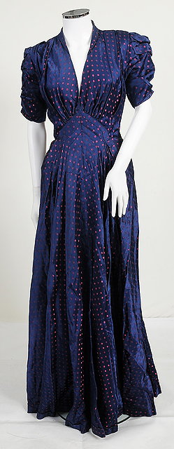 Appraisal: An early th Century long blue satin dress with purple