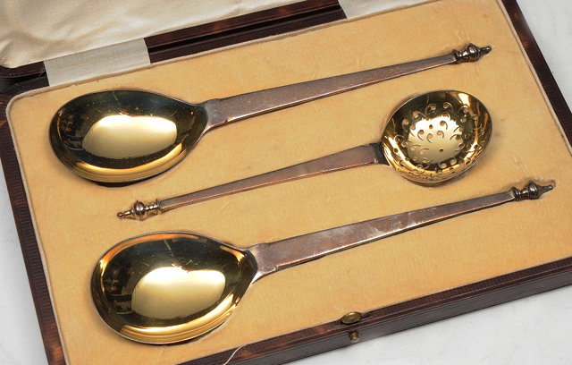 Appraisal: A SET OF THREE GEORGIAN STYLE SILVER SPOONS with gilt