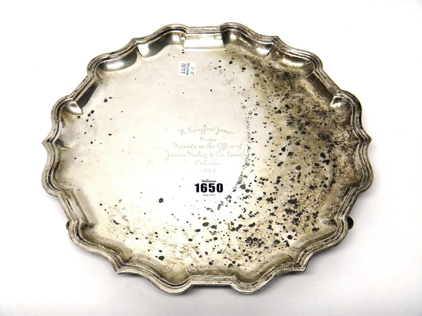 Appraisal: A silver salver of shaped circular form having a pie-crust