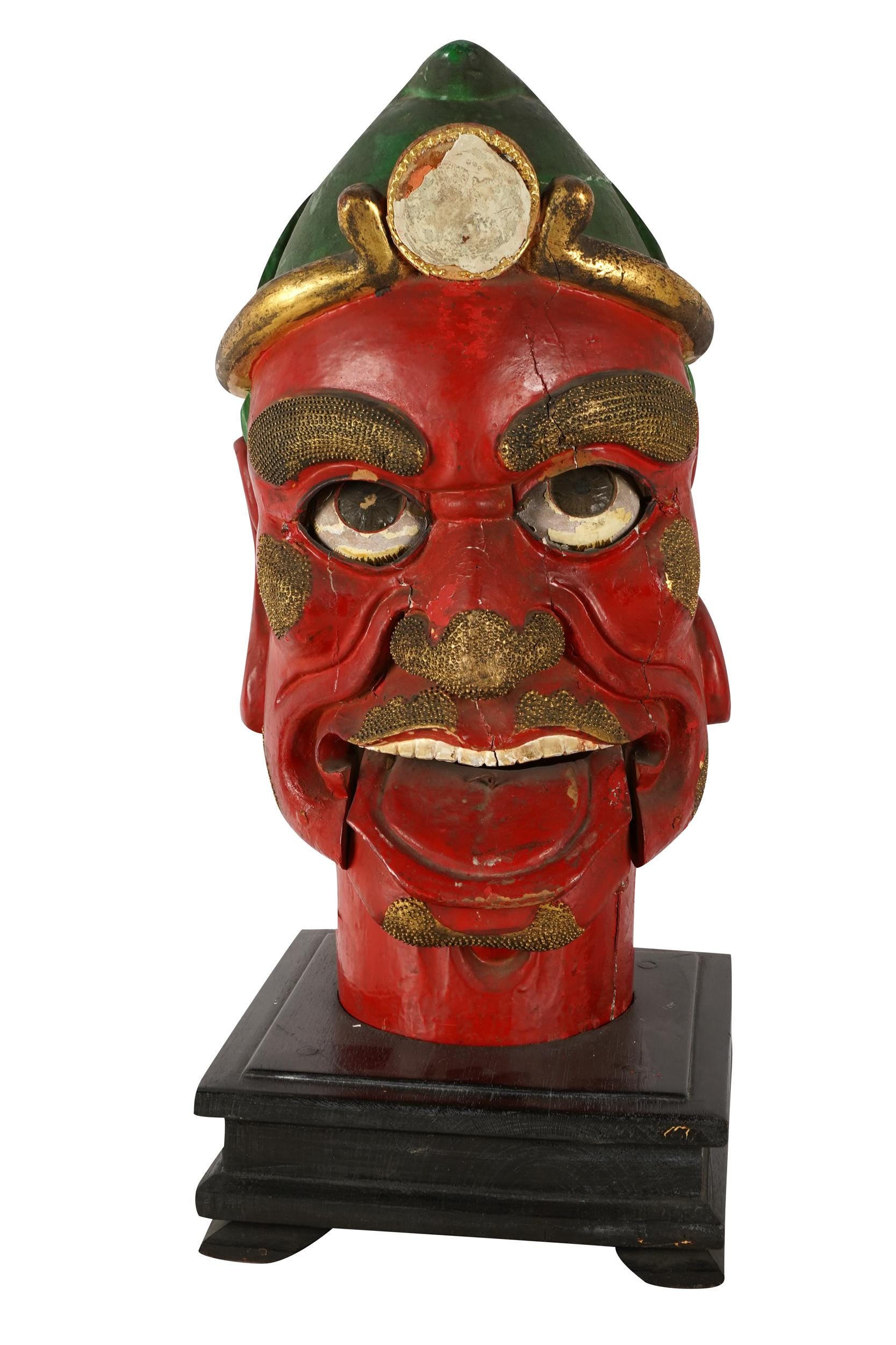 Appraisal: SOUTHEAST ASIAN STYLE CARVED PAINTED WOOD HEAD with movable eyes