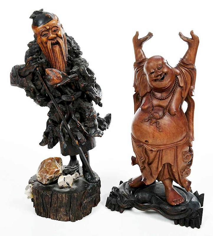 Appraisal: Two Carved Wood Asian Figures th century carved wood and