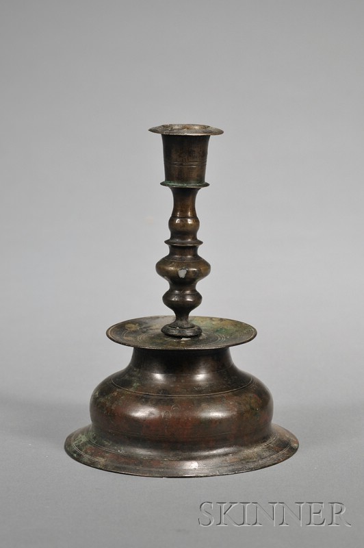 Appraisal: Early Brass Candlestick Nuremburg late th century with baluster shaft