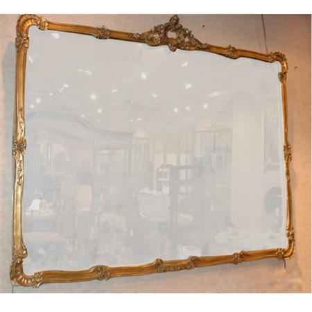 Appraisal: Rococo Style Gilt-Wood Mirror Estimate -