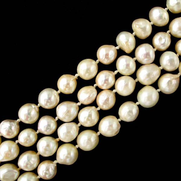 Appraisal: A strand of baroque cultured pearl necklace with a k