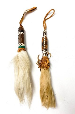 Appraisal: Two Tuareg North African Fly Whisks Two fly whisks made