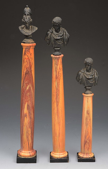 Appraisal: A SET OF THREE 'GRAND TOUR' BLACK BASALT MINIATURE BUSTS