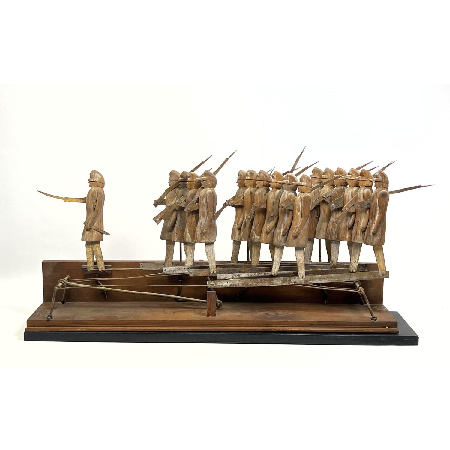 Appraisal: Folk Art Mechanical Sculpture of Military Marching Soldiers Tin and