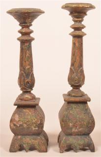 Appraisal: Pair of th Century Carved Wood Candlesticks Remnants of polychrome