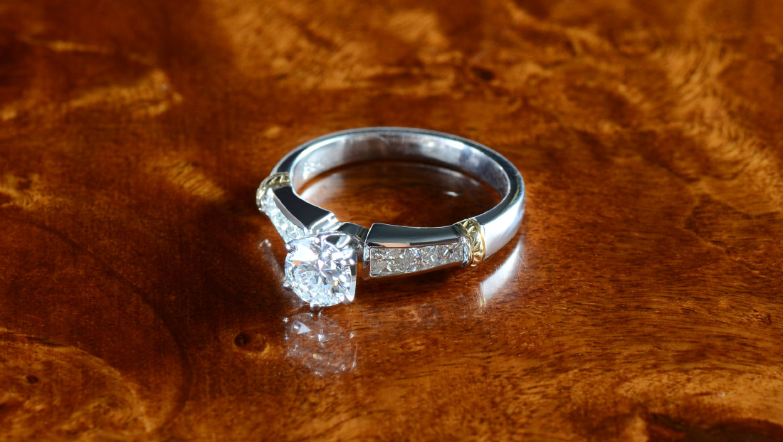 Appraisal: DIAMOND ENGAGEMENT RING k white gold centering a round brilliant