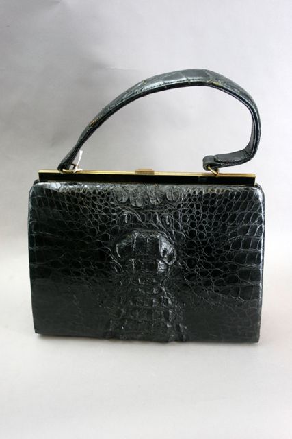 Appraisal: A ladies handbag in black crocodile with black leather lining