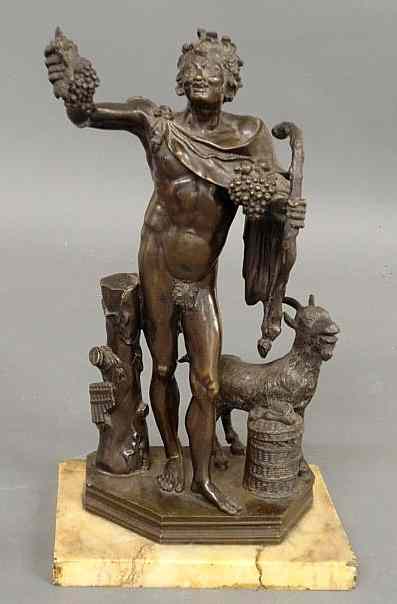 Appraisal: Bronze statue of Bacchus god of wine holding grapes and