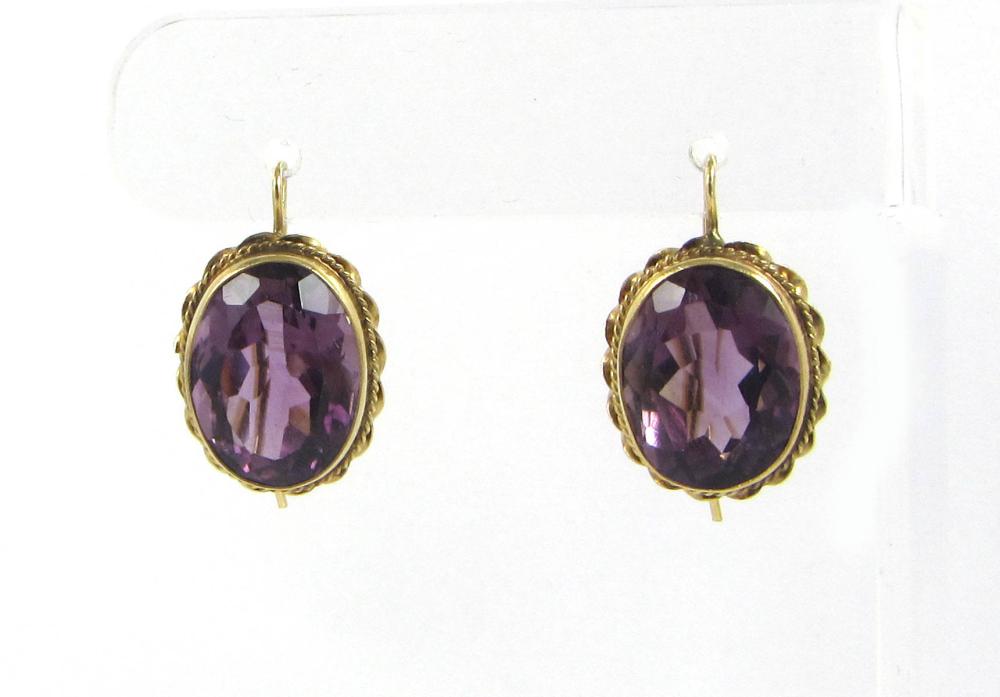 Appraisal: PAIR OF AMETHYST AND FOURTEEN KARAT GOLD EARRINGS each bezel