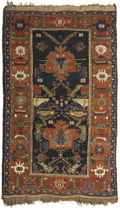 Appraisal: Northwestern Persian rug with a central blue field and red