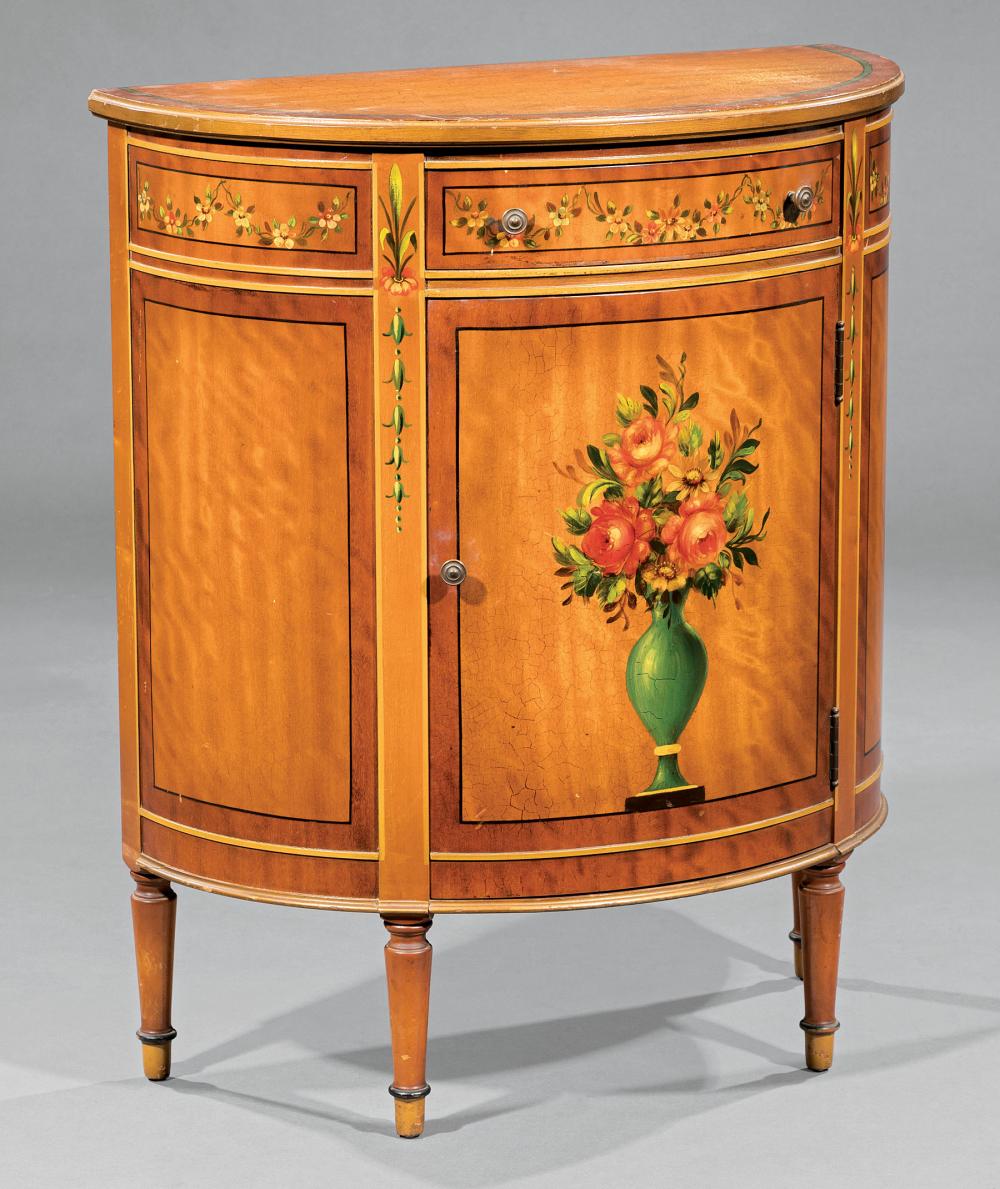 Appraisal: George III-Style Painted Satinwood Demilune Cabinet frieze drawer floral motifs