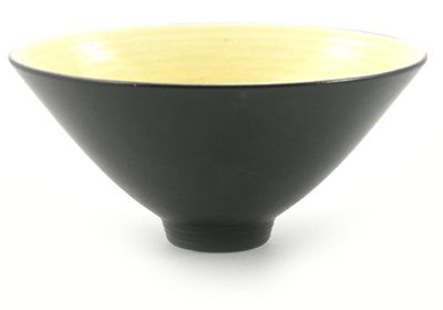 Appraisal: A Wedgwood earthenware bowl by Norman Wilson flaring conical form