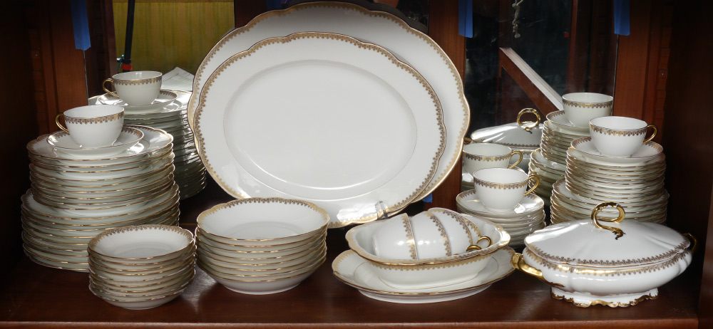 Appraisal: FRENCH LIMOGES FINE CHINA SERVICE Approx pieces with gold scalloped