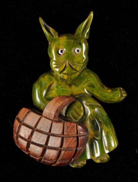 Appraisal: Bakelite Wood Rabbit with Basket Pin Description Rare Condition Excellent